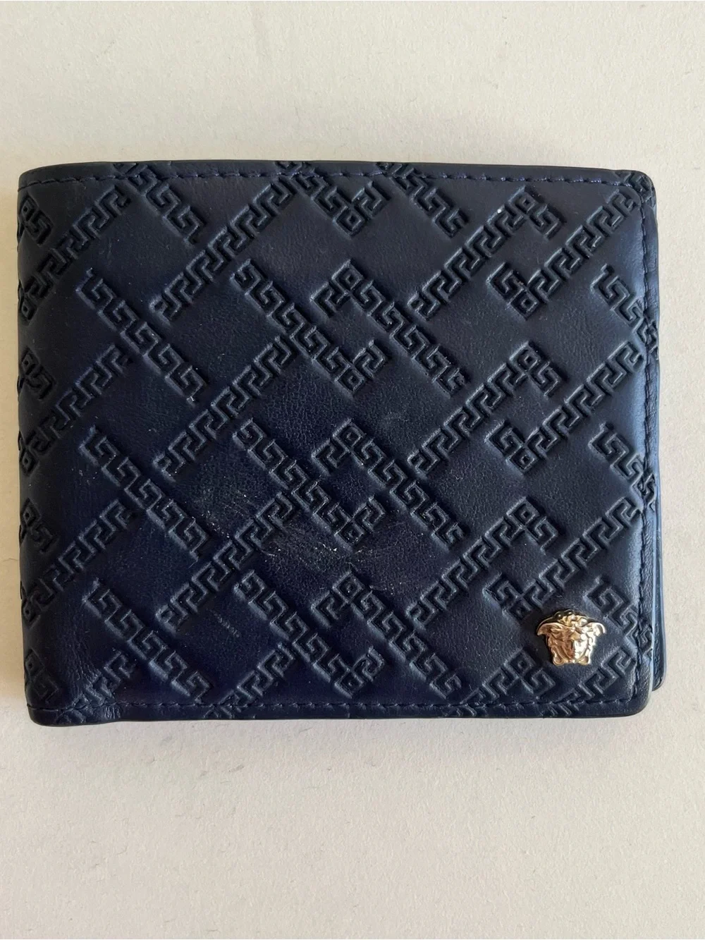 Versace Navy Embossed Leather Bi-Fold Wallet with Gold Medusa Accent